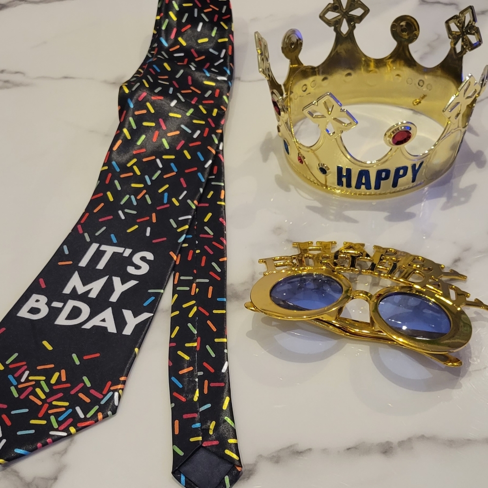 Birthday crown, tie, and glasses